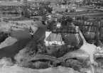 Flygfoto över Malung och Malungs kyrka år 1962.