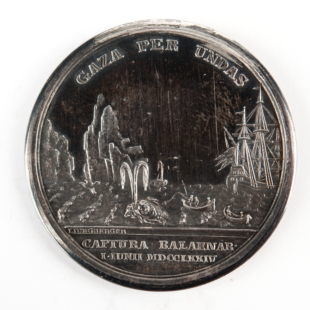 Åtsida: Porträtt av Gustav III.
Frånsida: Hav med isberg, valar och ett skepp med svensk örlogsflagg.