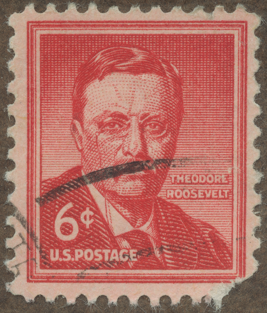 Frimärke ur Gösta Bodmans filatelistiska motivsamling, påbörjad 1950.
Frimärke från U.S.A., 1954. Motiv av Theodore ("Teddy")  Roosevelt. 1858-1919. Överste Jägare Författare USA:s 26-nde President 1901-1909. Nobel fredpriset 1906