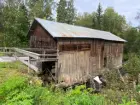 Wittersjö såg sedd från sydöst. Under bron anas den tidigare inloppsrännan.