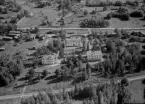 Flygfoto över Gärdebygården, S.M.F:s Semesterhem, Rättvik 1960.