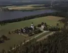 Flygfoto över Flisby kyrka i Nässjö kommun, Jönköpings län 283/1969