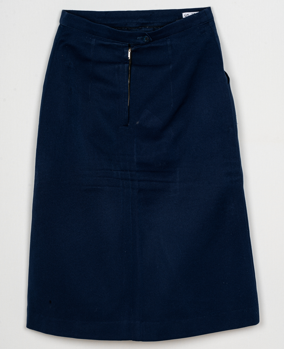 Mörkblå uniformskjol i gabardin.
