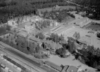 Flygfoto över Rättvik med Turisthotellet i förgrunden 1960.