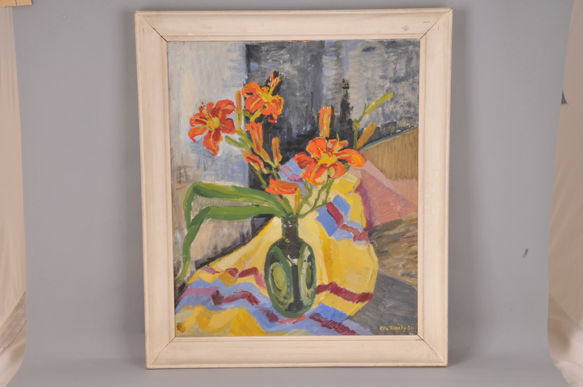Vase med blomster.