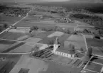 Flygfoto över Våmhus kyrka, Mora 1962.