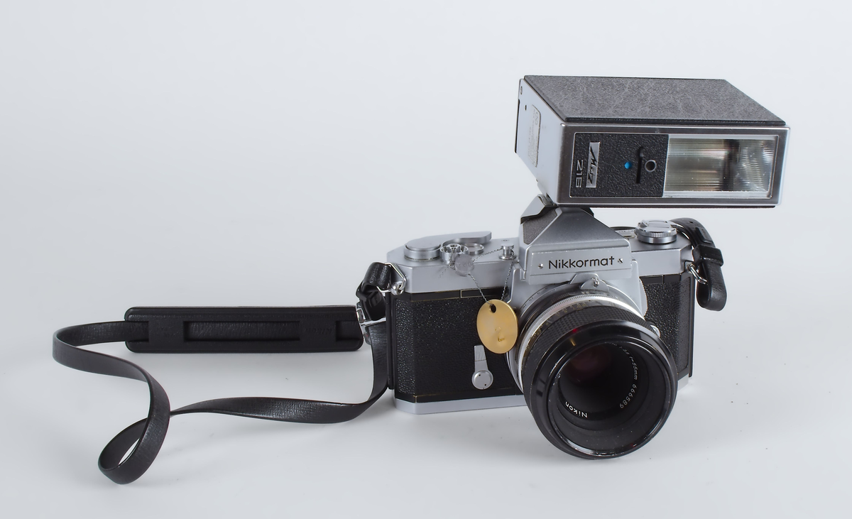 Fotografiapparat med blitz.