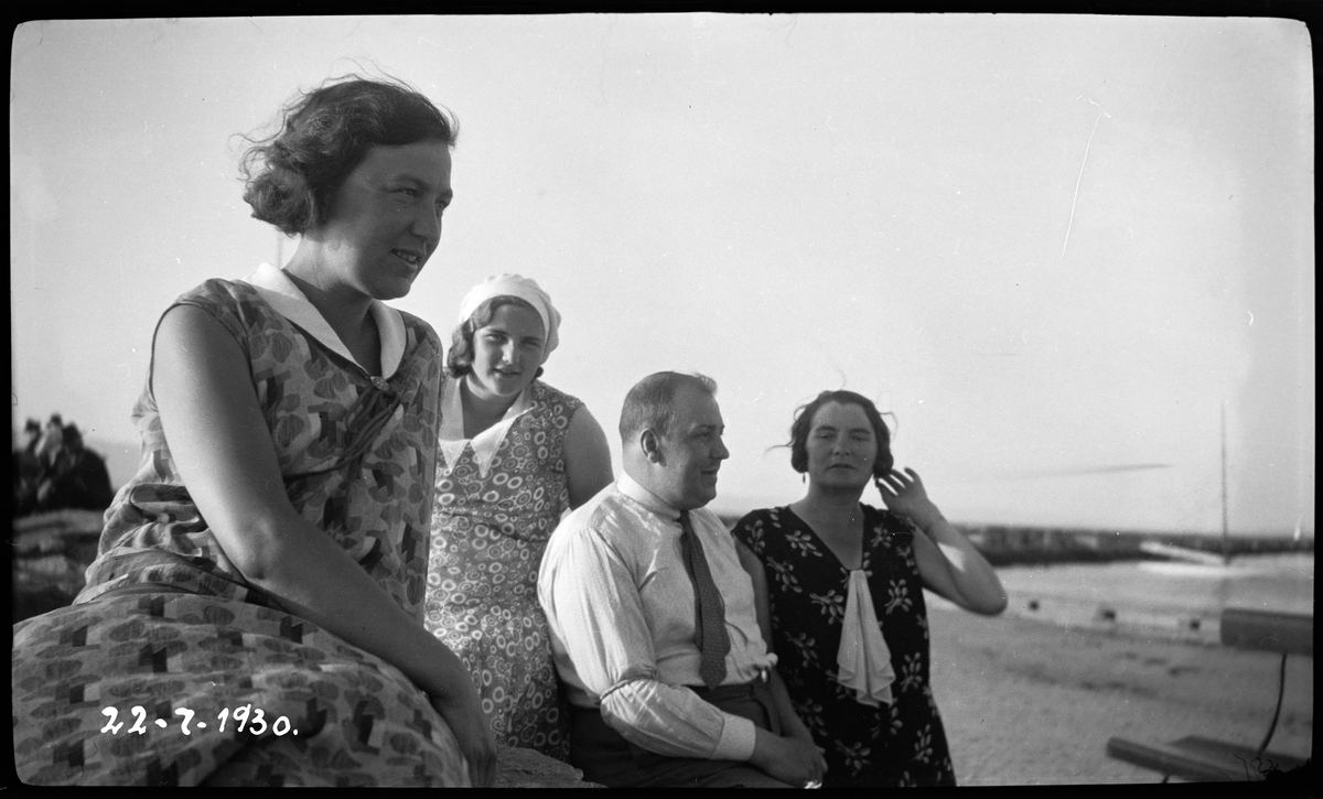 Personer på en strand