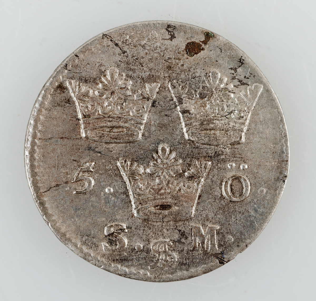 Mynt. 5 öre 1694 (Karl XI). Präglat i Stockholm.