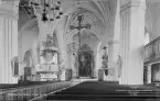 Interiör av Stora Tuna kyrka, Borlänge 1944. Läs mer om Stora Tuna kyrka i boken: Dalarnas kyrkor i ord och bild.