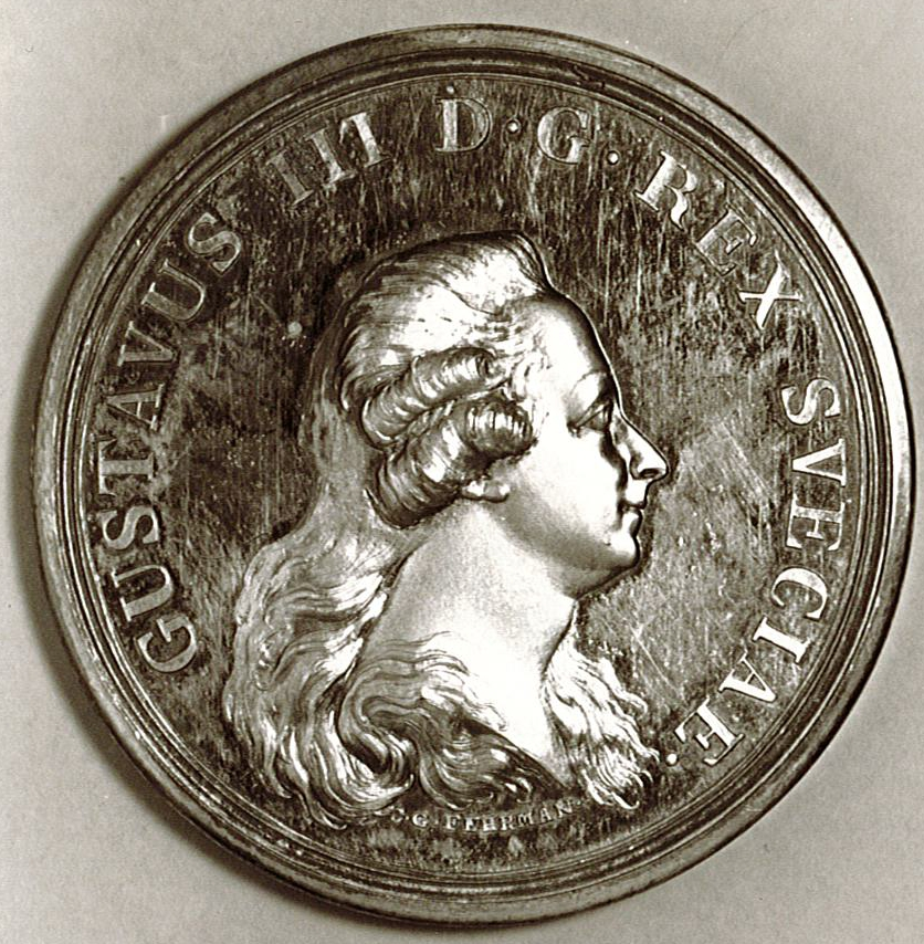 Åtsida: Gustav III. 
Frånsida: Romersk kapplöpningsvagn dragen av 4 hästar.