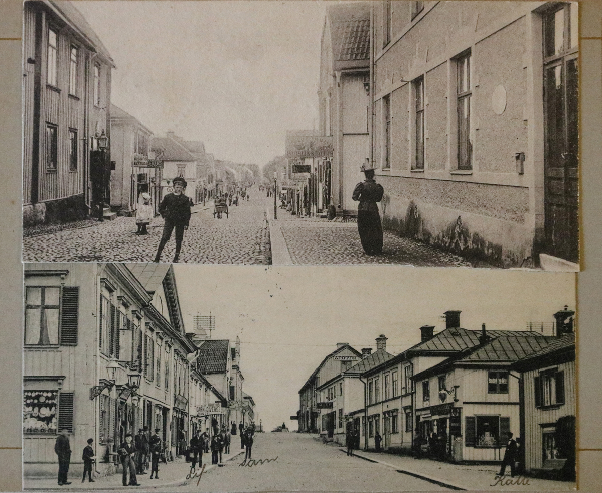 Två beskurna vykort inklistrade i vykortsalbum. Båda vykorten har motiv från Kungsgatan, Enköping. Det övre kortet är fotograferat från Telegrafhuset ut efter hela Kungsgatan ned mot ån. Det andra kortet är fotograferat åt andra hållet, alltså från ena hörnet av Stora torget upp mot Kungsgatan och Apotekarbacken. Båda vykorten är fotograferade av Anders Willmanson och inklistrade i vykortsalbum nr. EM06774:b. Denna sida i albumet har lossnat och ligger helt löst i pärmen.