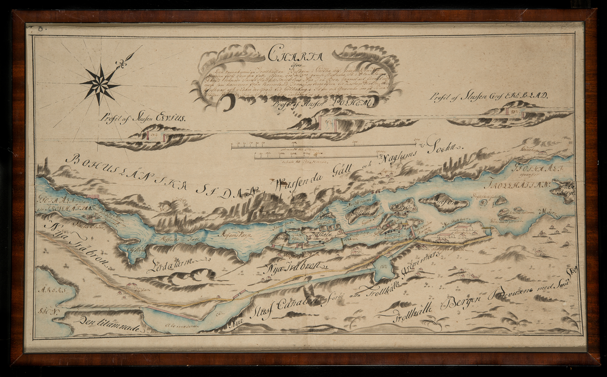 Karta över Göta Älv vid Trollhättan med profilen av slussen POLHEM. Inramad i slät mahognyram.