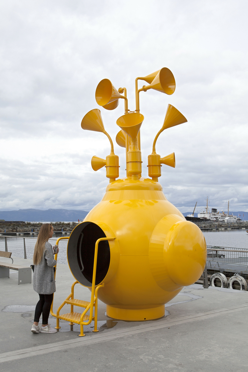 Gul kapsel med trompetformede vindfangere