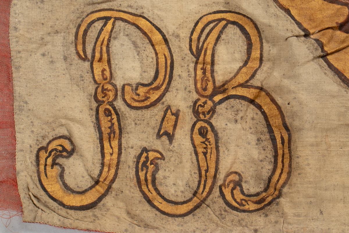 Dannebrog med kong Christian 7. (1749-1808) monogram og krone.