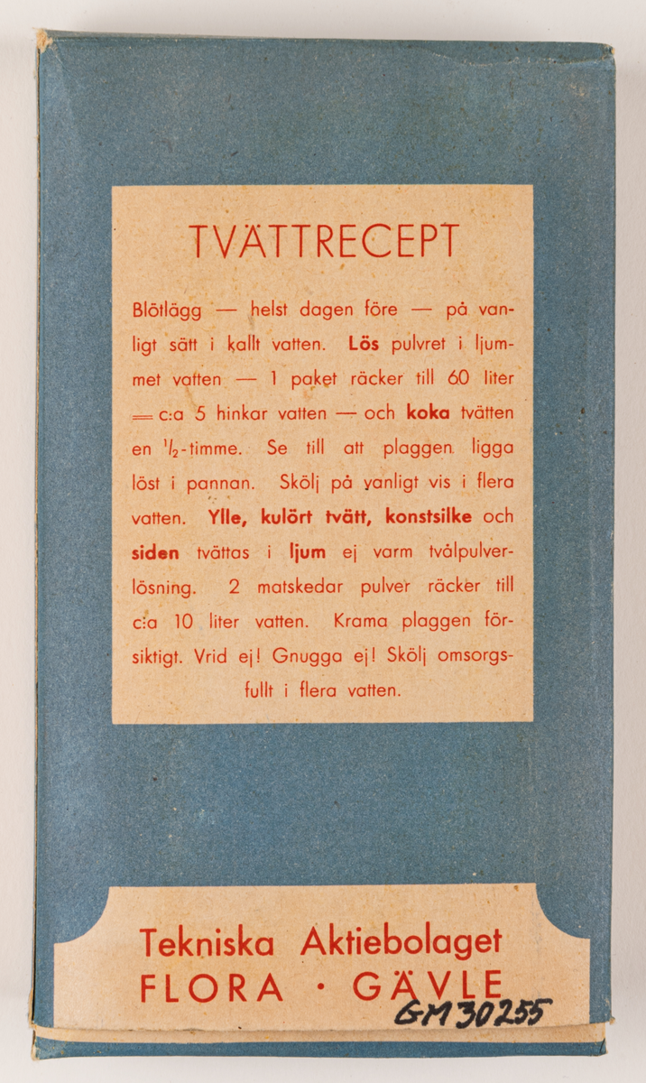 Tvålpulverförpackning, kartongpapp, maskintillverkad. 
Förpackning fylld med tvålfligor från Tekniska AB Flora, Gävle.
