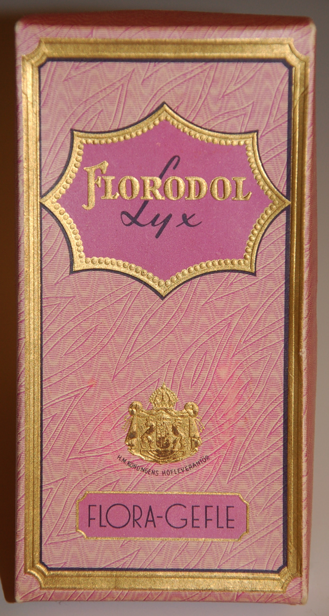 Tvålförpackning i rosa papp innehållande två tvålar.