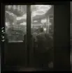 1950. Paris. Två män står vid en bar