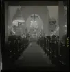 1950. Leksands kyrka. Folk i kyrbänkar