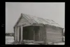 Fotografens anteckning: Byviken, stuga 1 söderifrån räknadt.