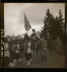 Parad. Deltagare till häst i historisk dräkt. Skansen, Stockholm.