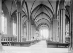 Interiör från Linköpings domkyrka. Utsikt genom mittskeppet mot kyrkans kor.