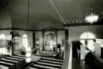 Interiör från Hälleberga kyrka innan branden 1976.