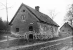 Arbetarbostäderna utmed Stenhusgatan i Åtvidaberg. Foto omkring år 1900.