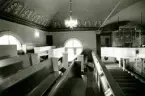Interiör från orgelläktaren i Hälleberga kyrka, innan branden 1976.