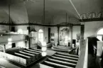 Interiör från Hälleberga kyrka innan branden 1976.