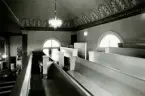 Läktaren i Hälleberga kyrka innan branden 1976.