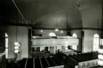 Interiör från Hälleberga kyrka innan branden 1976.