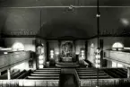 Interiör från Hälleberga kyrka innan branden 1976.