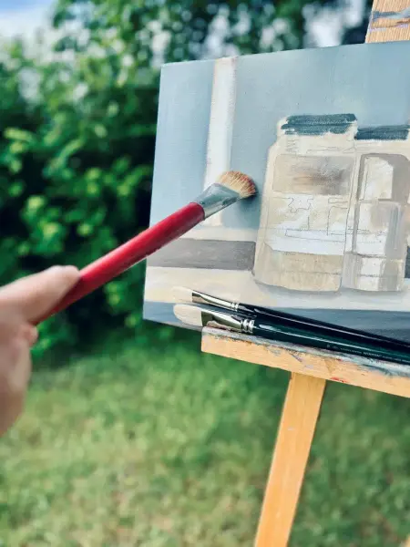 Maleri med pensel blått motiv 