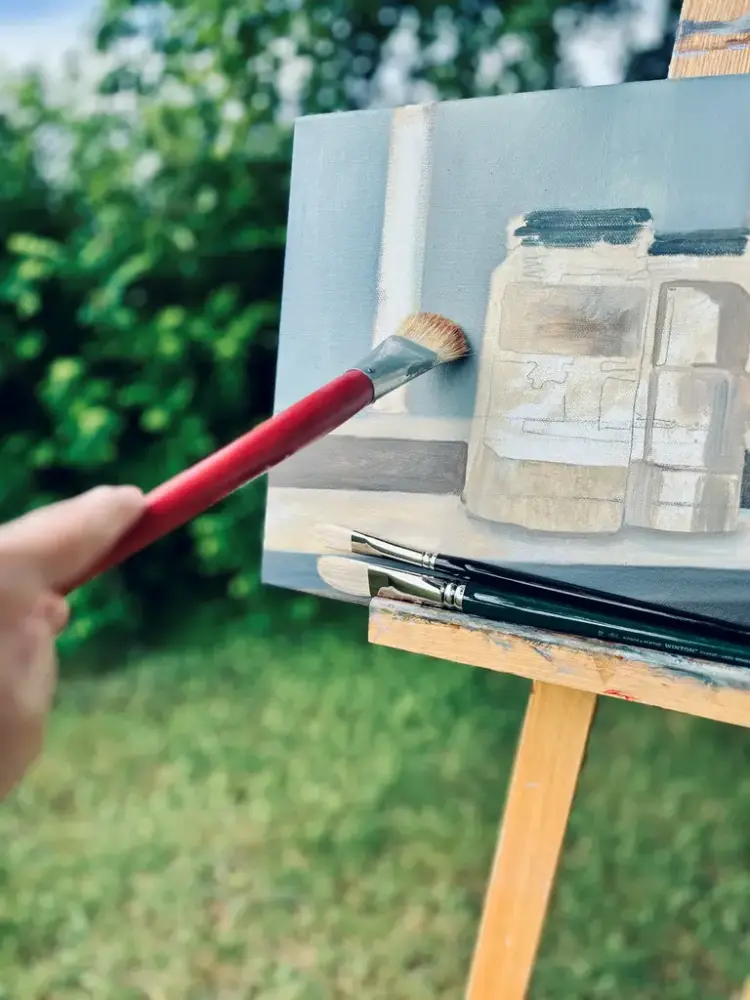 Maleri med pensel blått motiv 