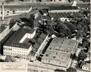 Flygfoto över R.P. Watsons tobaksfabriker. Wilson, North Carolina.
USA, 1940-tal.