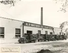 R.P Watsons tobaksanläggning. Bilar lastas med tobak. Wilson, North Carolina.
USA, 1940-tal.