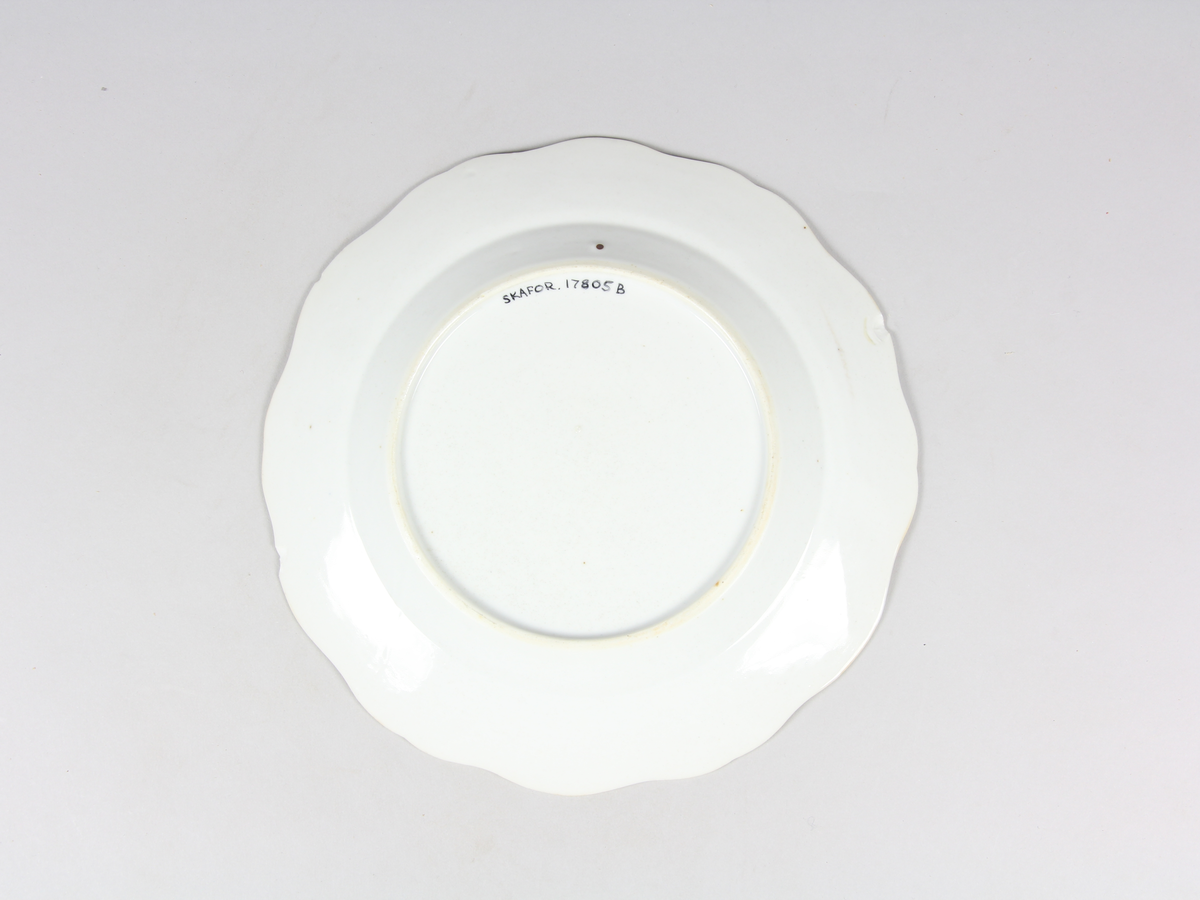 Floralt motiv med slingor och bårder.