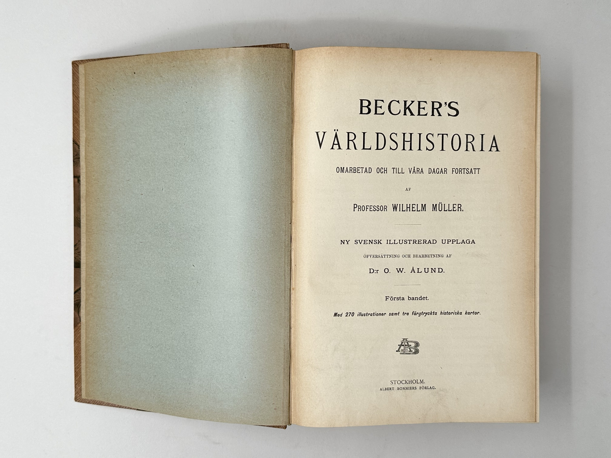 Bok: "Becker's världshistoria", första bandet. Halvklotband i strukturerad beige textil. Pärm i beigebrunt papper, abstrakt mönstrat. 