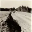 Vägskador från tjällossning. Dike. Väg 870 Rönndalen - Lembron vid Yttertänger. Idag riksväg 50.