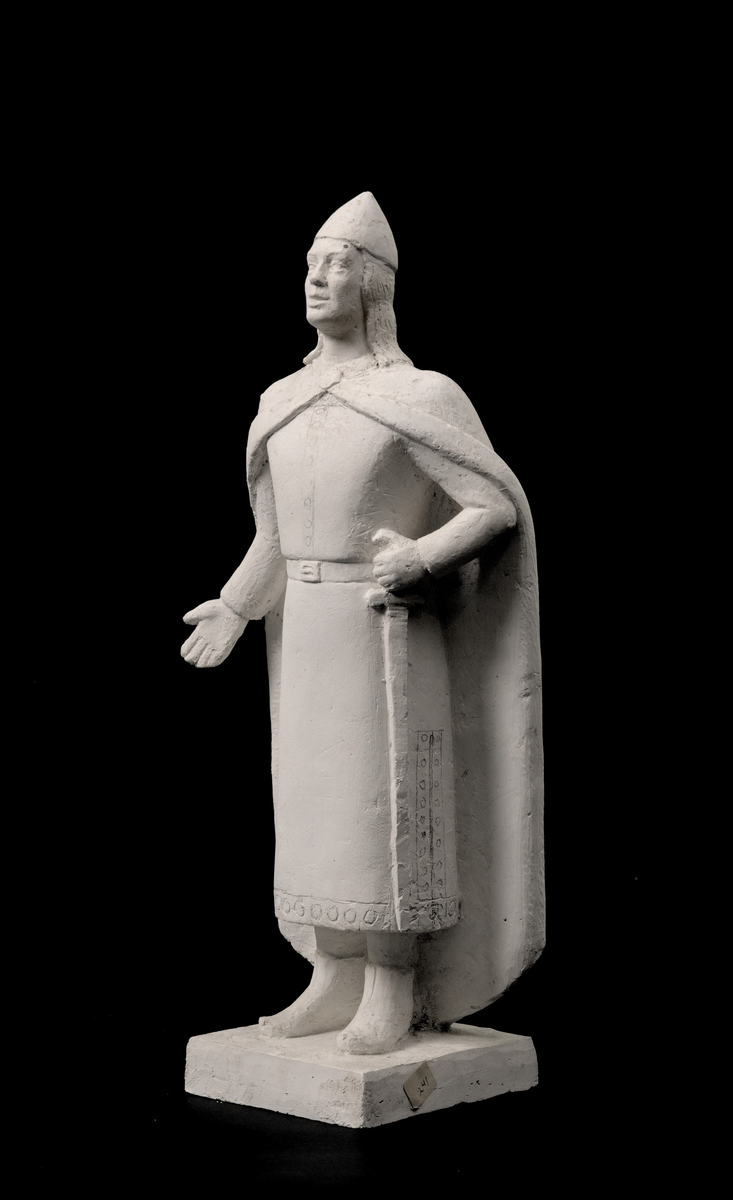 Heilfigur av Håkon den gode med utslaga hand