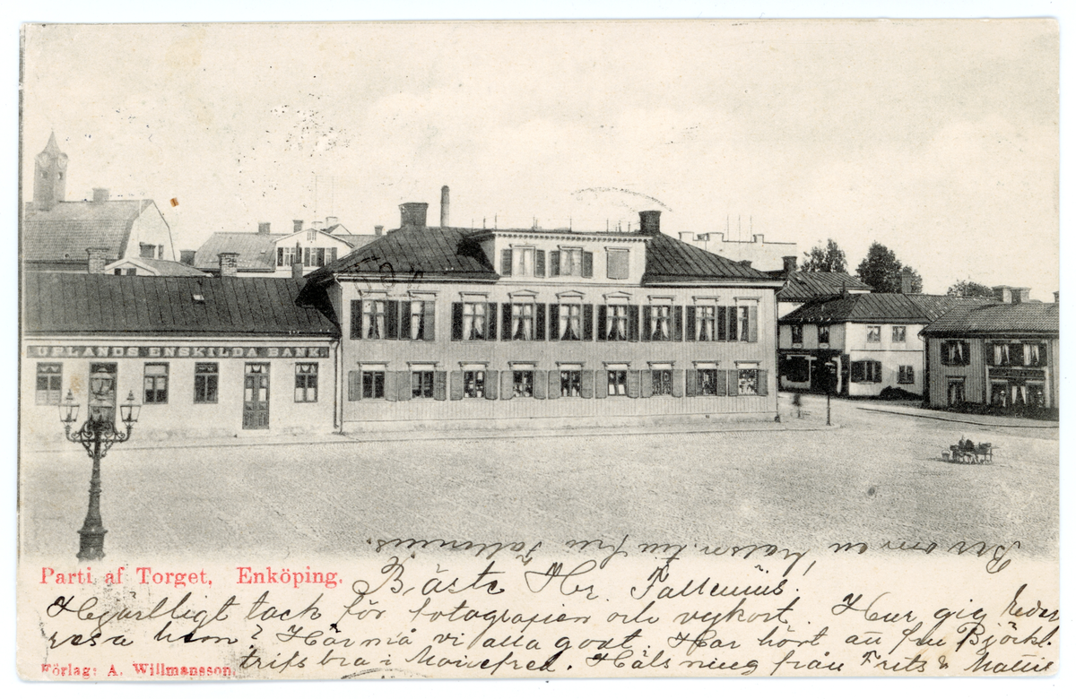 Lagerströmskahuset vid torget, Enköping. Vykortet är poststämplat den 30/4- 1902.