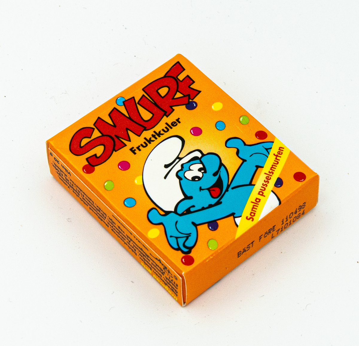 Tablettask i papper i orange med motiv av smurf, SMURF Fruktkuler. För dansktalande marknad.