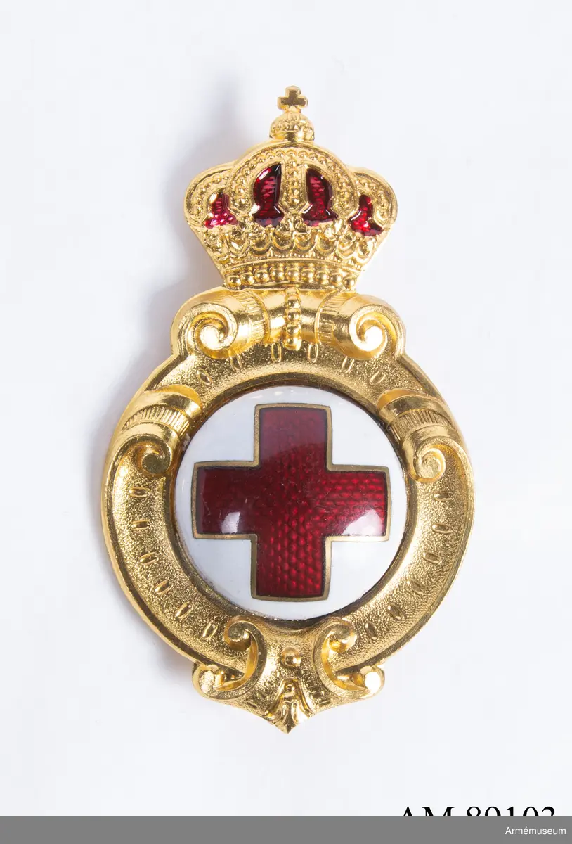 Röda Korsets emblem med krona ovanför.