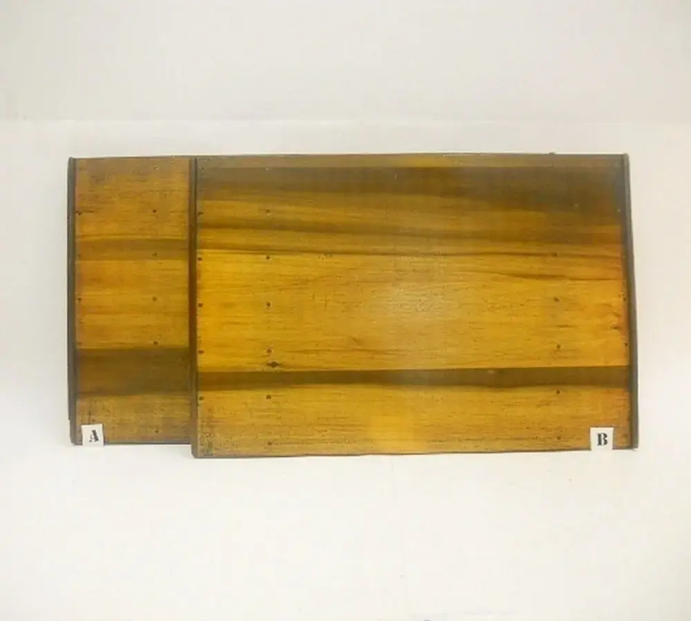 Myntuppsamlingsbricka av mörkt trä, 2 st.

SM 6546:a = 63,5 x 37 cm¤ SM 6546:b = 55 x 37 cm