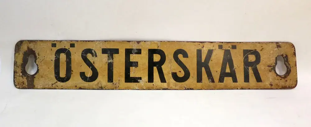 Post 6656a visar andra sidan av skylten, text Stockholm. Österskär invigdes 16 januari 1906.