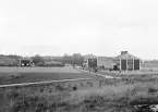Dagsberg omkring 1940. På bilden socknens ålderdomshem, skola och lärarbostad.