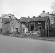 Rivningsarbete utmed Östgötagatan i Linköping där gatans nummer 3 och 5 demoleras. Foto 1959.