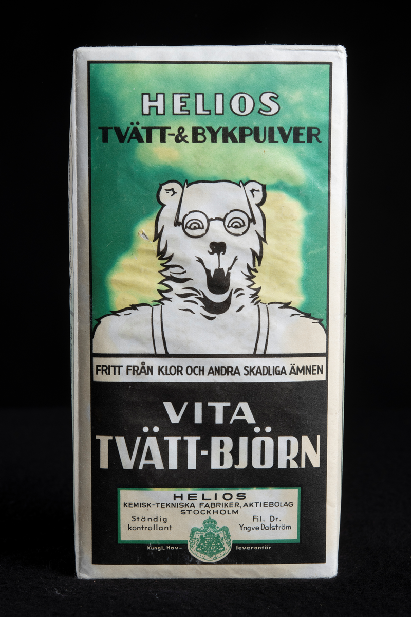 Emballage av vit papp med grönt och svart tryck.
Lådan har ursprungligen innehållit tvätt- och bykpulver.