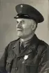 En äldre man i uniform med förtjänstmedalj.
Ateljéfoto.
Furir 56/8 Hugo Hedberg.